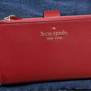 Kate Spade wristlet/ wallet. Never used. Brand new.